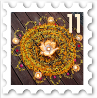 November/December 2021 SWG Challenge Holiday Party stamp - a flower candle surrounded by colored petals in circular patterns with five circular candles at the edges of the pattern