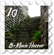 October 2018 B-Movie SWG challenge stamp - A flight of stone stairs curving slightly to the right, with grass growning in the corners of the stairs