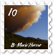 October 2018 B-Movie SWG challenge stamp - An ominous clous over a hilly landscape; it might be an incoming sandstorm but it also might be a volcanic eruption