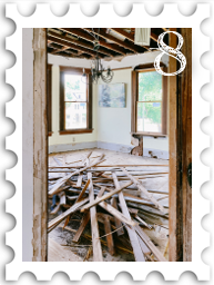 August 2022 Restoration and Rebuilding SWG challenge stamp - color photo of a partially gutted interior room, with construction debris on the floor