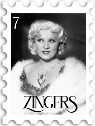 July 2022 Zingers SWG challenge stamp - a black and white photo of of Mae West looking at something off camera to the left; she wears a low-cut dress, an intricate pendant, and a white fur stole.