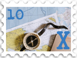 October 2022 X Marks the Spot SWG challenge stamp - color photo of a map, with a compass and notebook lying on top