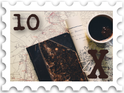 October 2022 X Marks the Spot SWG challenge stamp - color photo of a map with a rolled up map, an old book, and a cup of coffee on top