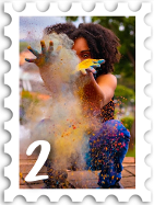 February 2024 Meet & Greet SWG challenge stamp -  photo of a woman of color tossing a handful of colorful dust or dye