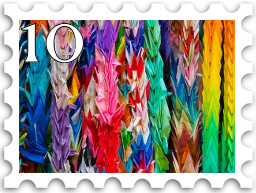 October 2023 Experimental SWG challenge stamp - photo of a large number of brightly colored origami cranes strung together
