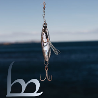 ampa tengwa with a fishhook against a background of sea and sky