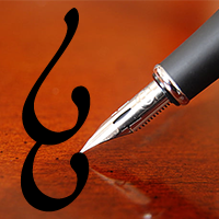 esse tengwar being written with a fountain pen