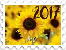 January 2025 Jubilee SWG challenge stamp - a photo of bright yellow sunflowers, with the number "2017" at upper right