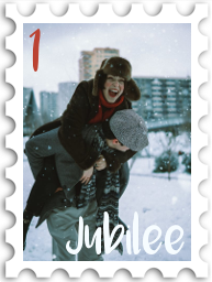 January 2025 Jubilee SWG challenge stamp - Photo of one person getting a piggyback ride from another on a snowy day. The person riding piggyback has an expression of joy.
