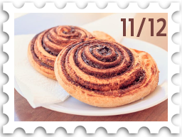 November/December 2025 Great Beleriand Bake-Off SWG challenge stamp - photo of two pullas served on a plate with a napkin