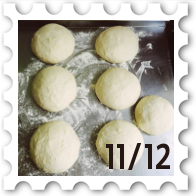 November/December 2025 Great Beleriand Bake-Off SWG challenge stamp - a photo of seven dough balls rising on a floured surface
