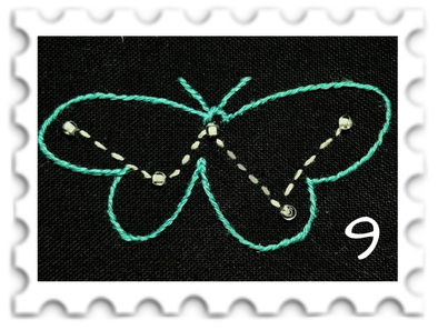 September 2026 Stars SWG challenge  stamp - embroidery of the constellation Wilwarin against a black bacground. The stars are picked out in pale gold, the outline of the butterfly is in a light green.