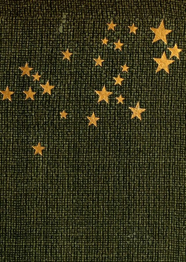 a dark green book cover of coarse-woven fabric scattered with gold stars